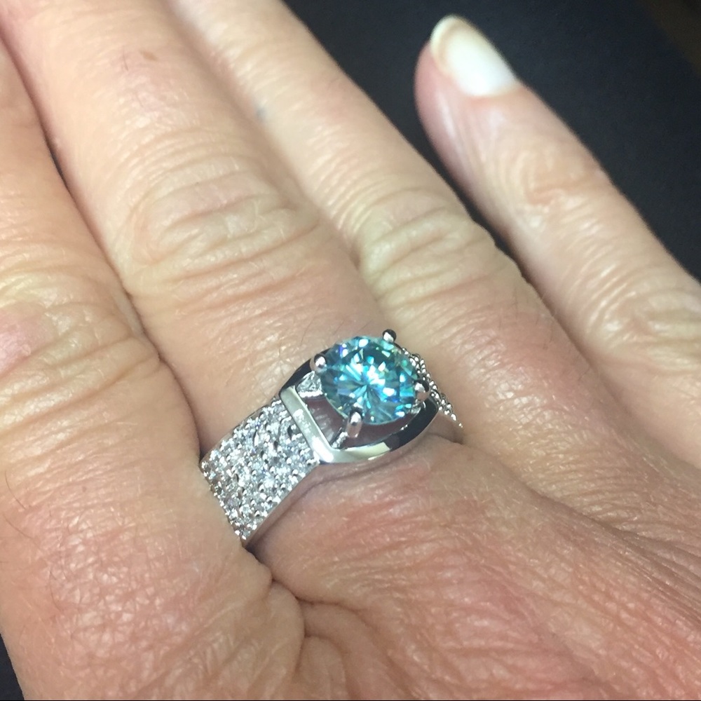 New 1.60 act. Blue Moissanite & Cubic Zicron Ring